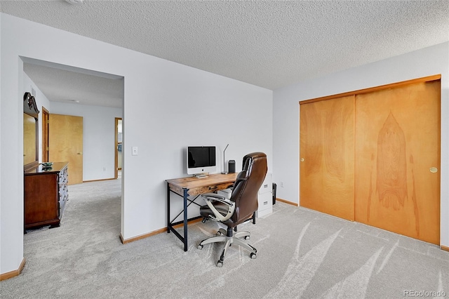 9717 Castle Ridge Cir, Highlands Ranch, CO 80129 - carpeted home office featuring a textured ceiling