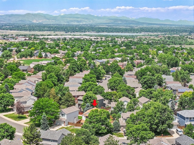 9717 Castle Ridge Cir, Highlands Ranch, CO 80129 - aerial perspective of suburban area featuring a mountainous background