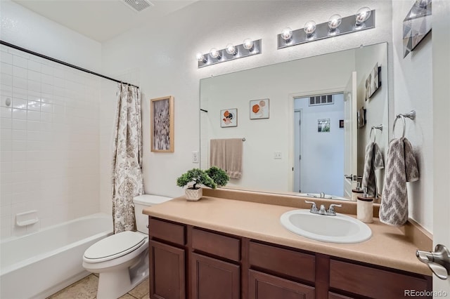 full bathroom with tile patterned floors, shower / bath combo, vanity, and toilet