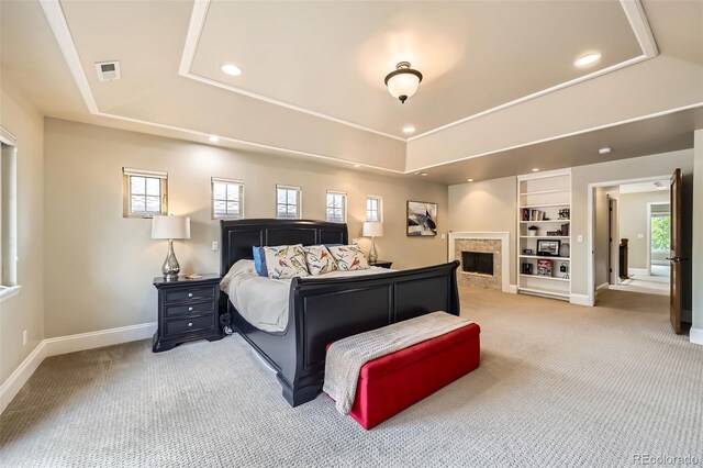 1410 S Elizabeth St, Denver, CO 80210 - bedroom with a raised ceiling, light colored carpet, multiple windows, and recessed lighting