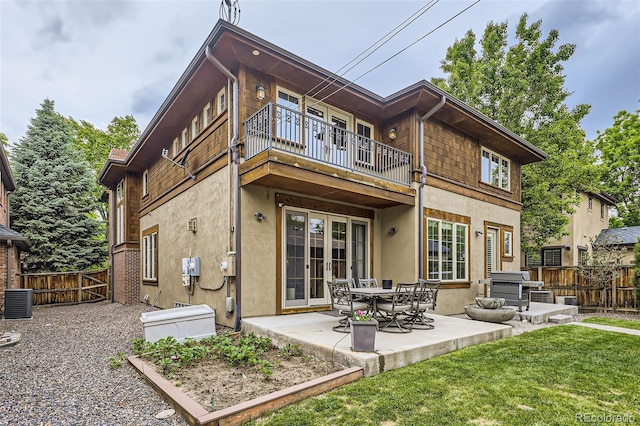 1410 S Elizabeth St, Denver, CO 80210 - rear view of property featuring a balcony, a patio area, stucco siding, french doors, and cooling unit