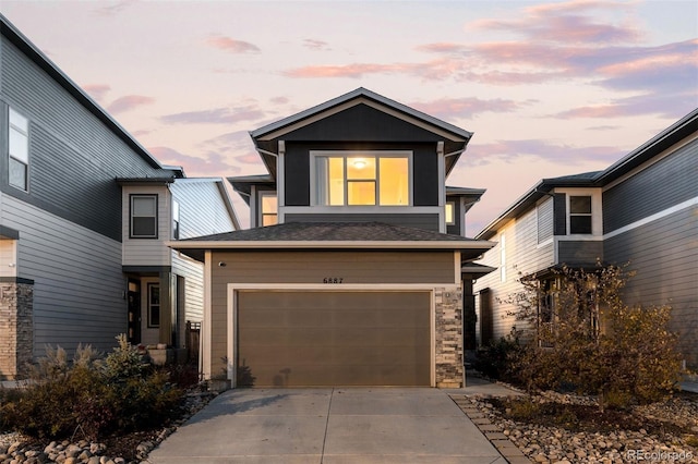 view of front of property with a garage