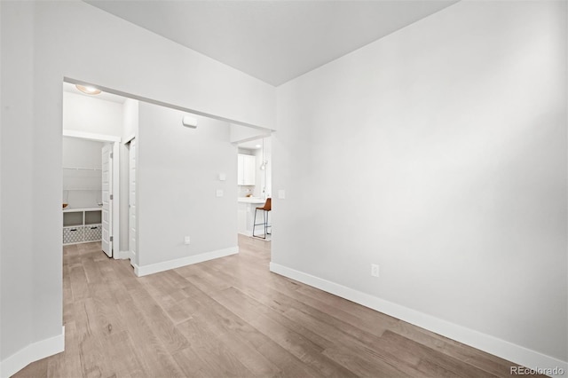 empty room with light wood-type flooring