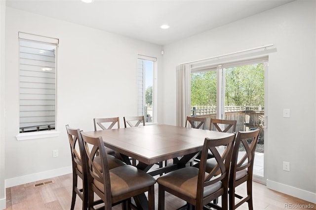 dining room featuring light hardwood / wood-style flooring