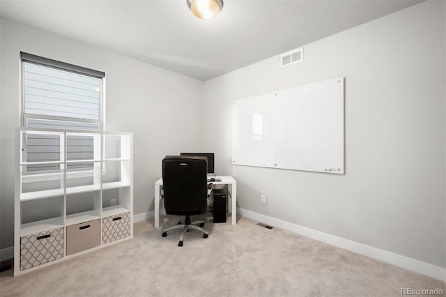 view of carpeted home office