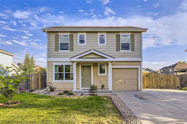 front of property with a garage and a front lawn