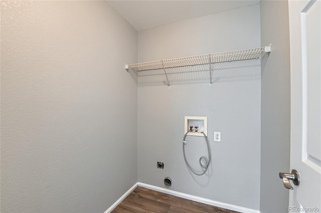 clothes washing area featuring dark wood-type flooring, washer hookup, and electric dryer hookup