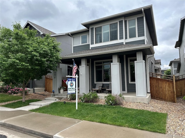 6834 Clay St N, Denver, CO 80221 - view of front of house featuring a porch