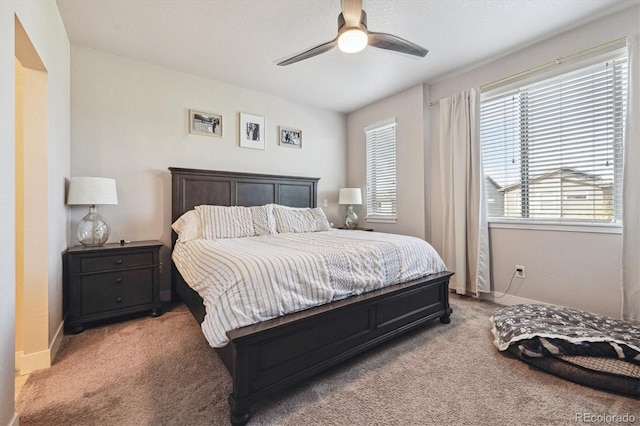 6834 Clay St N, Denver, CO 80221 - carpeted bedroom featuring baseboards and ceiling fan