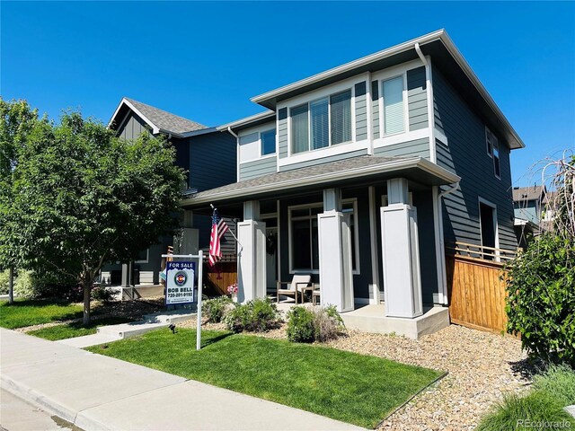 6834 Clay St N, Denver, CO 80221 - view of front of house featuring covered porch