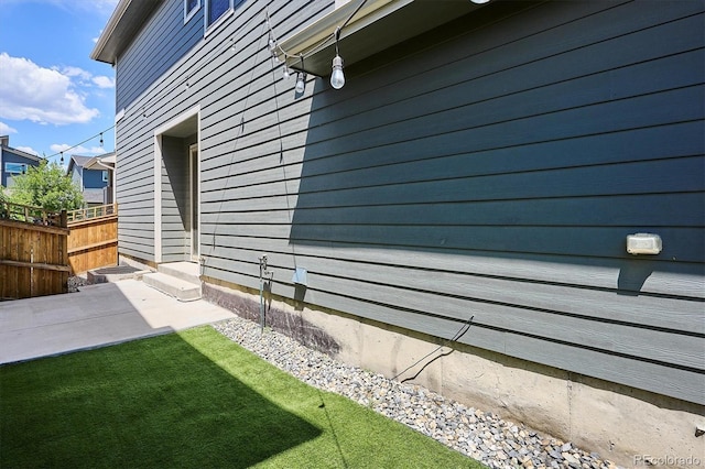 6834 Clay St N, Denver, CO 80221 - view of home's exterior with a patio