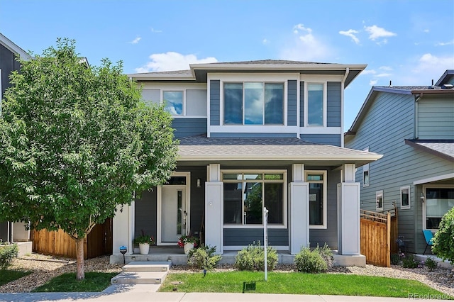 6834 Clay St N, Denver, CO 80221 - prairie-style house with covered porch and a shingled roof