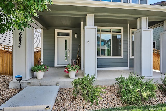 6834 Clay St N, Denver, CO 80221 - view of exterior entry featuring a porch