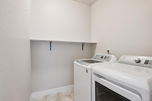 6834 Clay St N, Denver, CO 80221 - laundry area featuring independent washer and dryer and baseboards