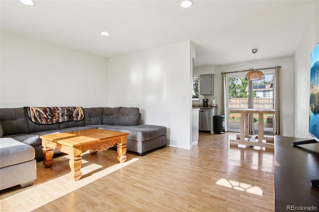 4759 S Xenophon St, Morrison, CO 80465 - living room with light wood-style floors and recessed lighting