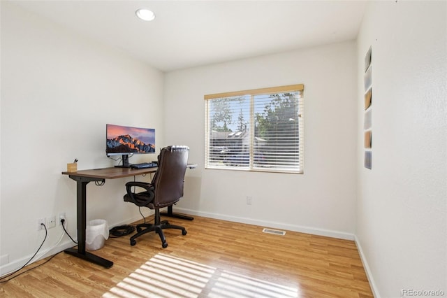 4759 S Xenophon St, Morrison, CO 80465 - home office featuring light wood-style flooring and recessed lighting