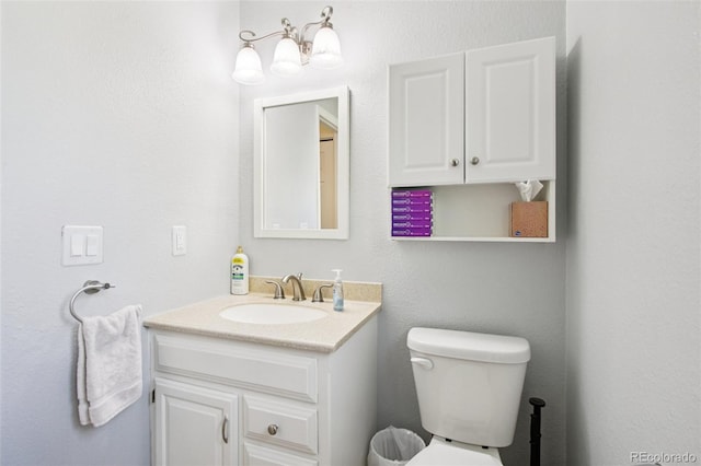 4759 S Xenophon St, Morrison, CO 80465 - bathroom featuring vanity and toilet