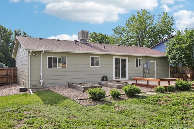 4759 S Xenophon St, Morrison, CO 80465 - back of house featuring a deck, a garden, and roof with shingles
