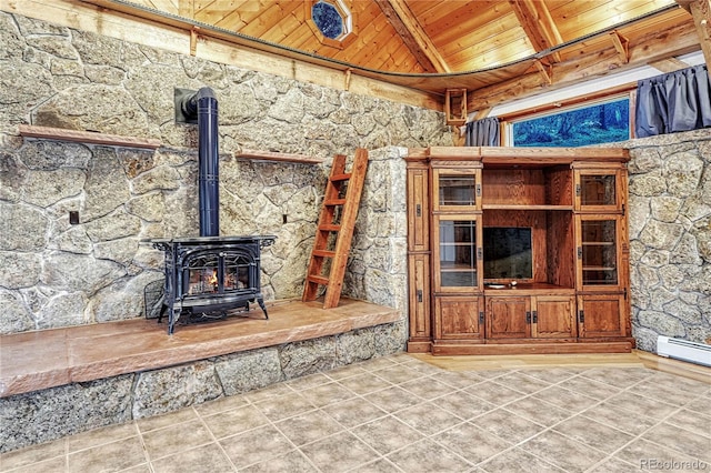 unfurnished living room with a wood stove, beam ceiling, tile patterned flooring, and wood ceiling