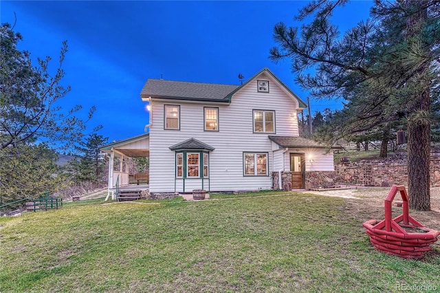 view of front of home featuring a front yard