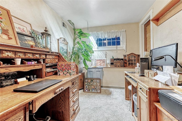 home office with light colored carpet