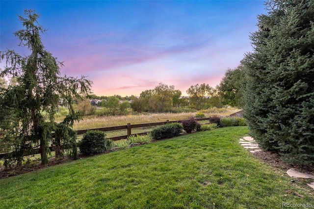 yard at dusk with fence