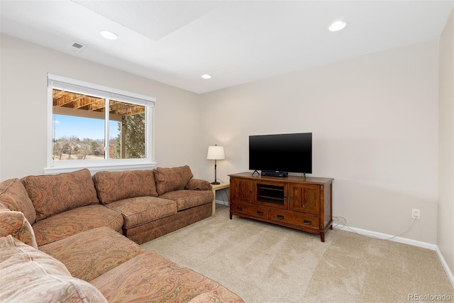 living room with light carpet, recessed lighting, visible vents, and baseboards