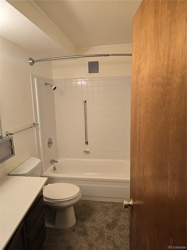 full bathroom featuring vanity, toilet, and tiled shower / bath combo