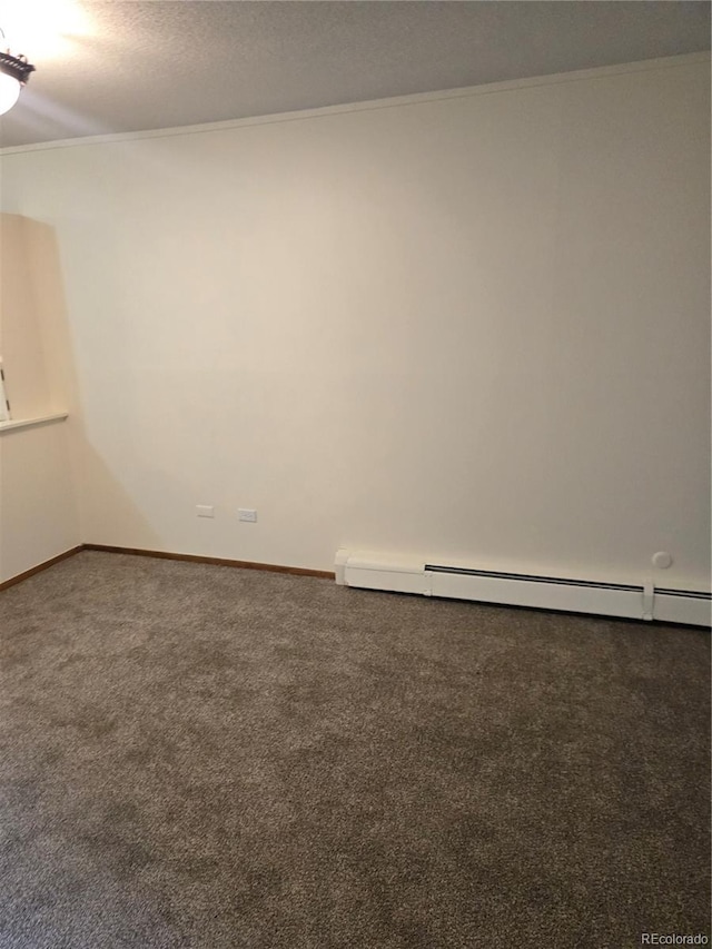 carpeted empty room featuring a textured ceiling, crown molding, and a baseboard radiator