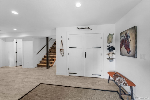 663 Brookside Dr, Bailey, CO 80421 - foyer featuring stairs and recessed lighting