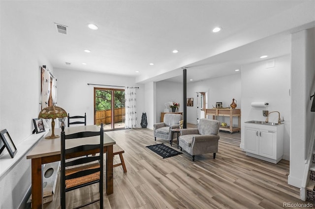 663 Brookside Dr, Bailey, CO 80421 - living room featuring light wood-style flooring and recessed lighting