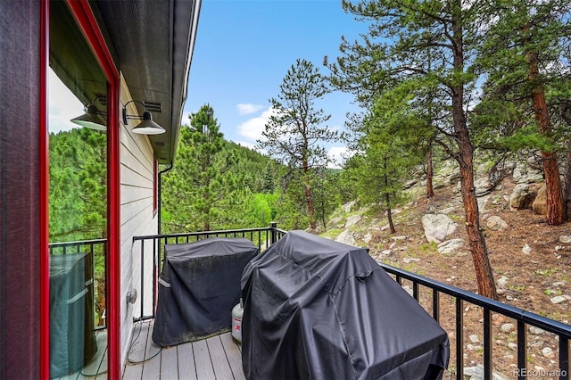 663 Brookside Dr, Bailey, CO 80421 - balcony featuring grilling area and a forest view