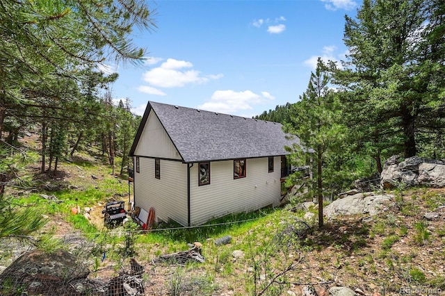 663 Brookside Dr, Bailey, CO 80421 - view of side of home with roof with shingles