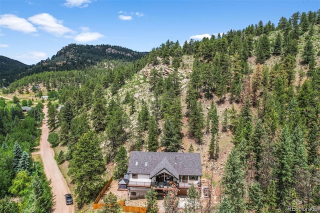 663 Brookside Dr, Bailey, CO 80421 - aerial view of property and surrounding area with a forest and mountains