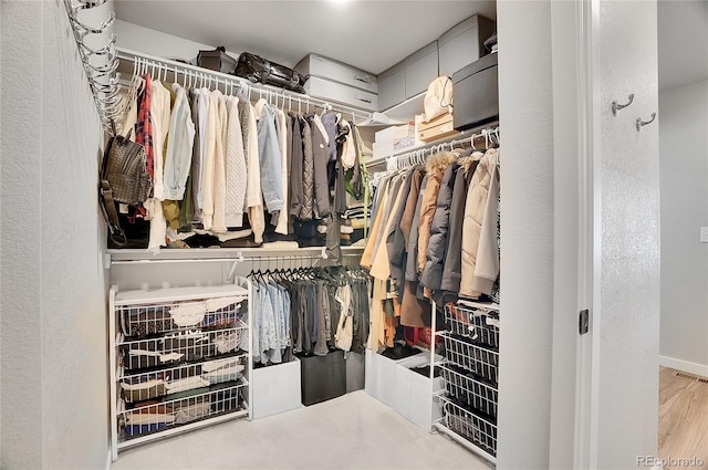10912 Memphis Ct, Commerce City, CO 80022 - spacious closet with wood finished floors