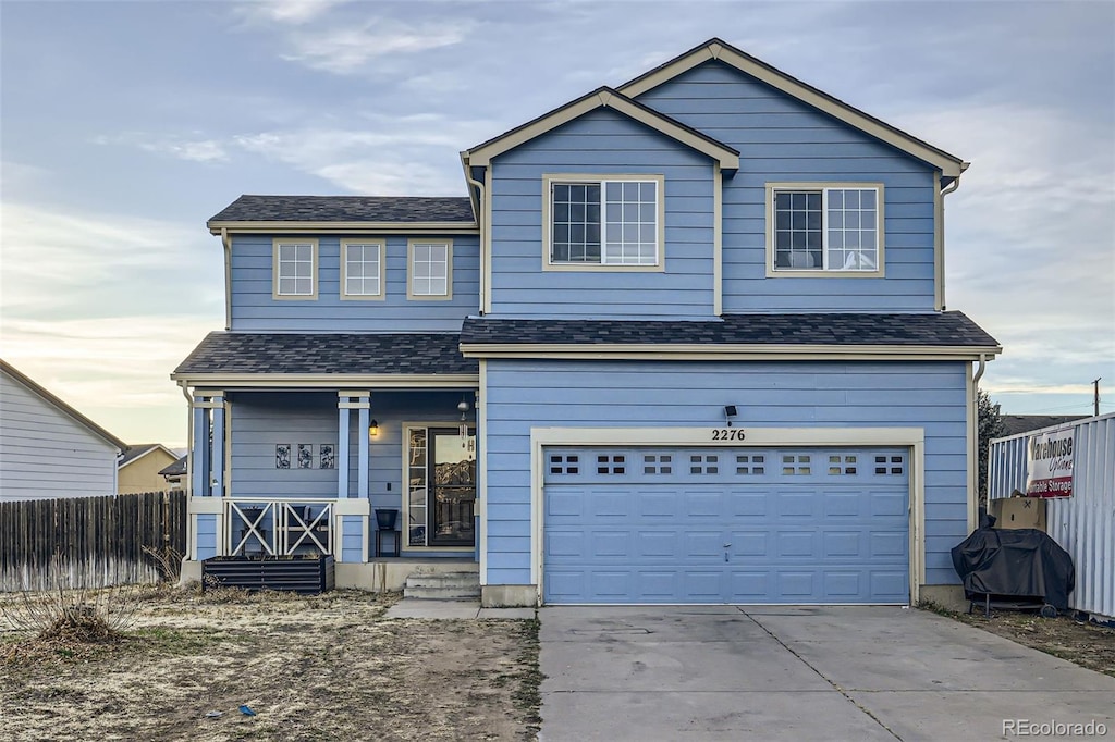 view of front of property featuring a garage