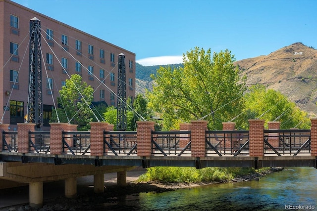view of property's community with a water and mountain view