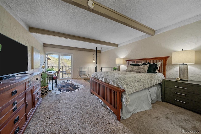 bedroom featuring a textured ceiling, access to exterior, beamed ceiling, a textured wall, and light carpet