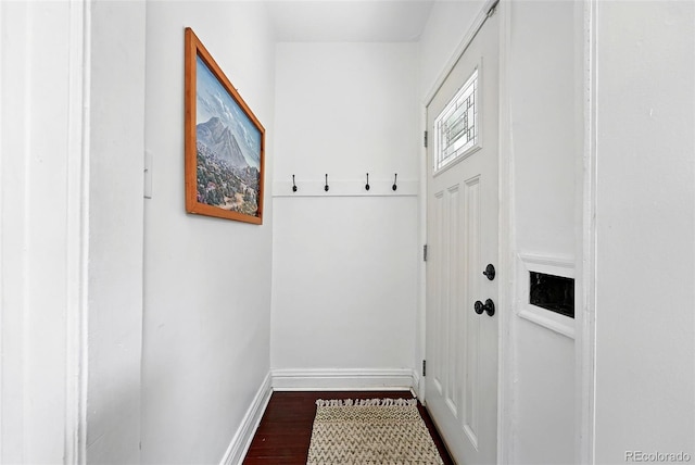 1331 Osceola St, Denver, CO 80204 - entryway with dark wood-style floors and baseboards