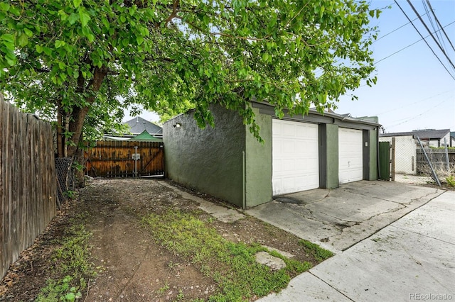 1331 Osceola St, Denver, CO 80204 - detached garage with a gate