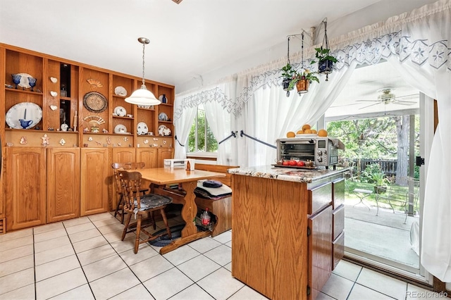 2516 S Cimarron St, Aurora, CO 80014 - kitchen featuring light tile patterned flooring, open shelves, pendant lighting, ceiling fan, and a center island
