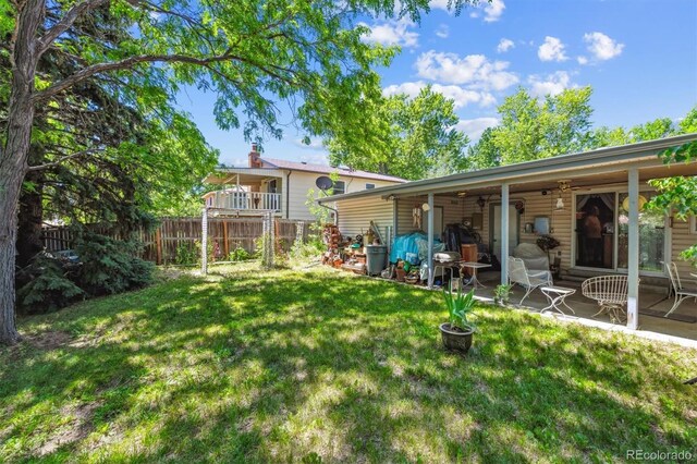 2516 S Cimarron St, Aurora, CO 80014 - view of yard with a patio