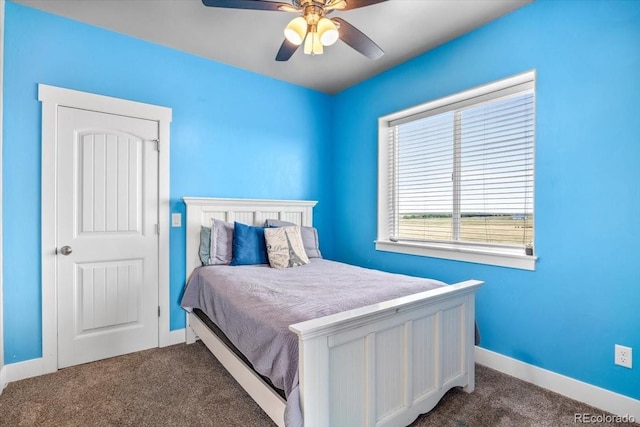 45425 Wolf Creek Dr, Bennett, CO 80102 - carpeted bedroom featuring baseboards and ceiling fan