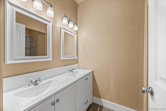 45425 Wolf Creek Dr, Bennett, CO 80102 - full bath with double vanity and tile patterned flooring