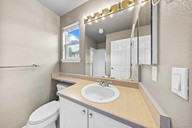 6427 S Tibet St, Aurora, CO 80016 - bathroom with vanity and a textured wall