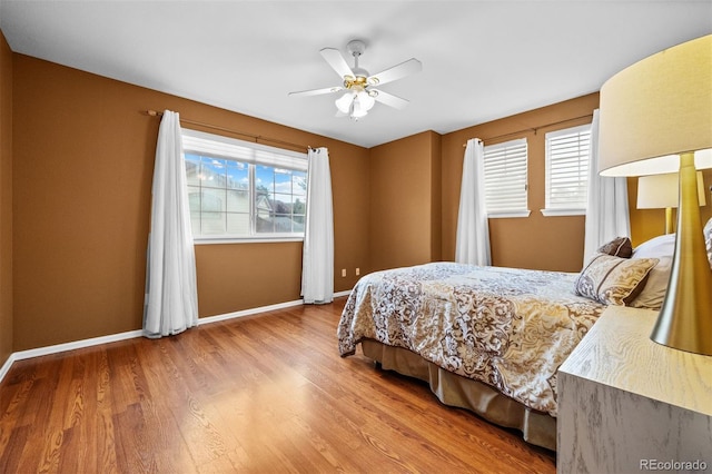 6427 S Tibet St, Aurora, CO 80016 - bedroom featuring wood finished floors and ceiling fan
