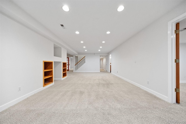 6427 S Tibet St, Aurora, CO 80016 - finished basement featuring recessed lighting, light carpet, and stairway