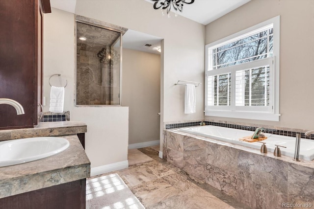 bathroom featuring baseboards, visible vents, a tile shower, a garden tub, and vanity