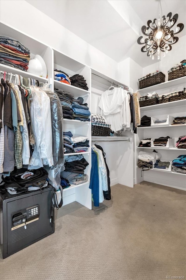 walk in closet featuring carpet