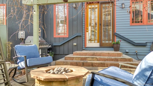 doorway to property with board and batten siding